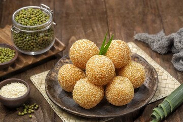 Onde-onde or sesame balls are a type of market snack cake that is famous in Indonesia. Sesame balls are easy to find in traditional markets or sold at street vendors