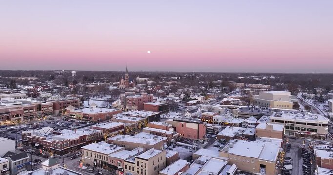 aerial view of the city Winter Aerial View of Downtown Naperville at Sunset &ndash; Illinois Cityscape with Snow-Covered Buildings&rdquo; Experience the charm of downtown Naperville in winter 