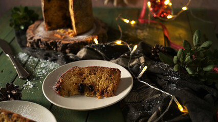 Cozy Christmas Panettone Slice on a Green Table