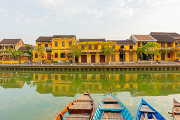 Morning sunrise Hoi An, old houses on the waterfront reflected in the river. Vietnam