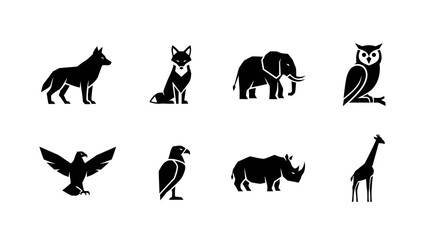 Dynamic collection of diverse wild animal vector silhouettes, featuring majestic predators and iconic herbivores, presented in a clean, minimalist graphic style for versatile use