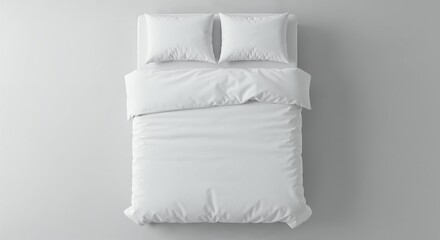A pristine white bed with two pillows and a duvet is neatly made, viewed from directly above on a clean, light gray background, offering ample copy space.