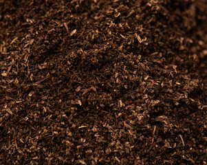 Texture and surface of soil mixed with manure background.