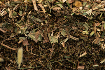 Compost from dry leaves background.