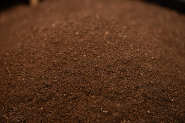 Texture and surface of soil mixed with manure background.