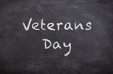 Obraz premium Hand drawn chalk sketch on blackboard with the text Veterans Day for Veterans Day symbolizing respect gratitude and recognition for veterans