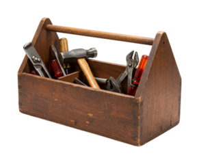 Old wooden toolbox filled with various hand tools displays a collection of essential implements for repair and construction, showcasing a rustic and vintage aesthetic with warm, natural lighting