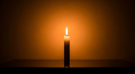Single candle flame radiating in serene ambiance against warm backdrop