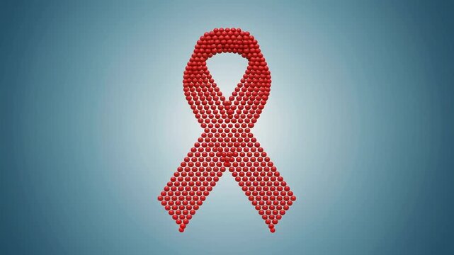 Digital Red Ribbon Symbol Forming from Pixels for HIV AIDS Awareness.