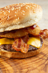 A closeup view of a BBQ bacon burger.