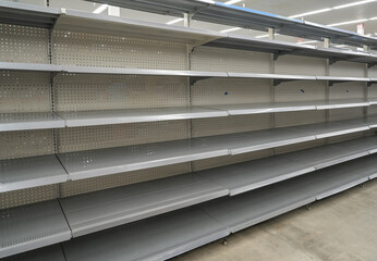 empty store shelves in supermarket