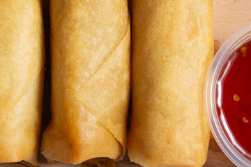 A top down view of some egg rolls.