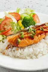 A view of a salmon teriyaki plate.