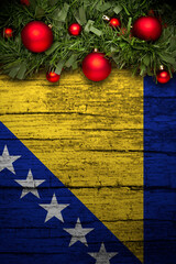 christmas decoration on wooden background from bosnia