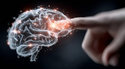 Human finger illuminates a glowing digital brain wireframe, symbolizing innovation, intelligence, and cutting edge technology discoveries