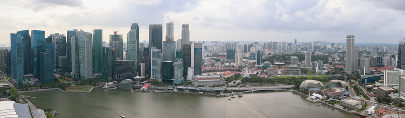 Panorama View of the famous Marina Bay Sands building and Singapore skyline as seen on a cloudy day