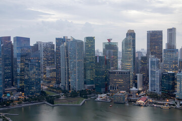 Fototapeta premium Aerial view of the famous Singapore skyline as seen on a cloudy day