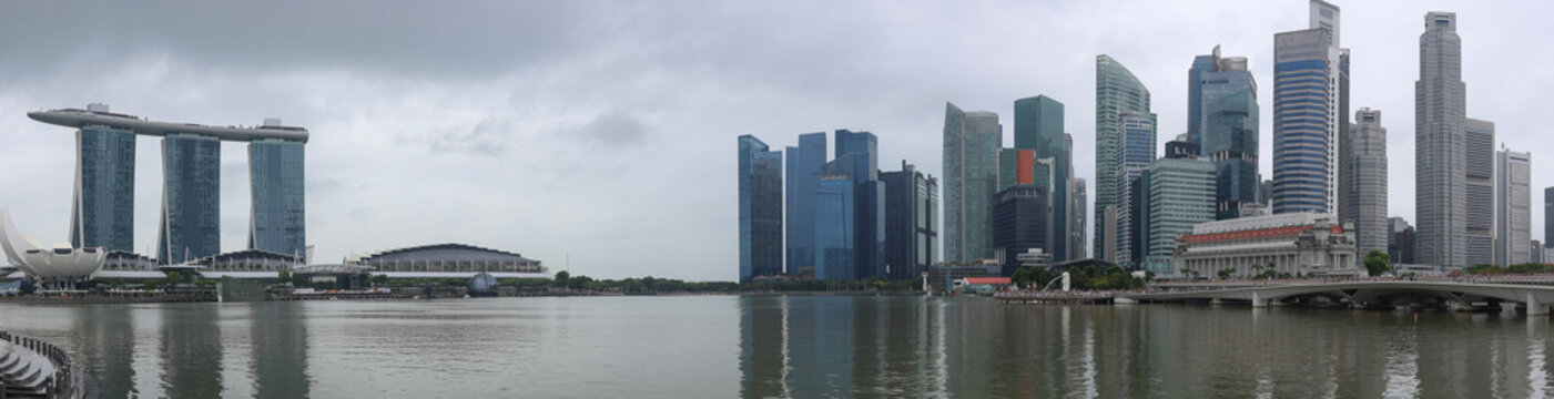 Panorama View of the famous Marina Bay Sands building and Singapore skyline as seen on a cloudy day