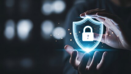 Cybersecurity and data protection concept with glowing shield and padlock icon in hands.