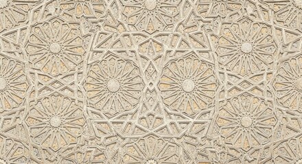 Close-up of an intricate beige floral patterned surface with geometric shapes.