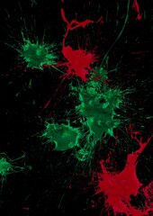red and green paint splash with black background
