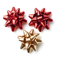 Three shiny metallic gift bows in red and gold for festive occasions