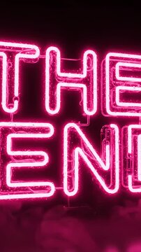Pink Neon Sign The End Text Glowing In Dark Room With Smoke Effect and Reflection