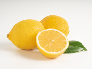 Fresh Lemon Halves On Clean White Background