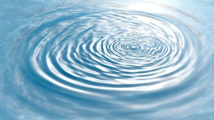 Light blue water ripples from a drop impact