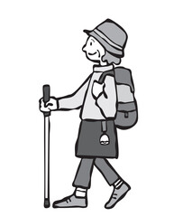 熊よけの鈴をつけて登山をする女性（シニア）