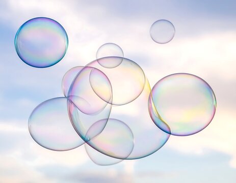 Several translucent, spherical bubbles floating against a cloudy, light sky