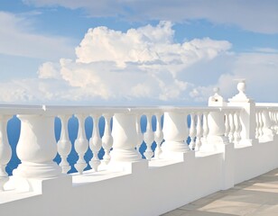 Scenic view from a white balustrade overlooking a vast blue sea under a fluffy cloud-filled sky