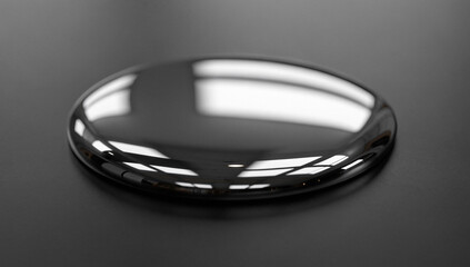 Mercury liquid metal drop on dark surface