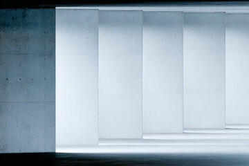 Modern architectural space featuring clean lines and illuminated concrete walls in a minimalistic design environment