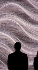 Silhouetted figures observing a dynamic, wavy abstract light display in a dark room, creating an immersive and contemplative atmosphere.