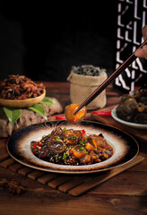 Spicy Chinese Stir-Fry with Mushrooms and Peppers on Limewood Bowl