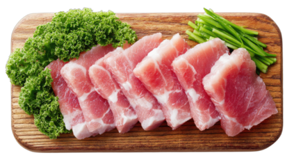 Slices of raw meat arranged on a wooden board with green garnish