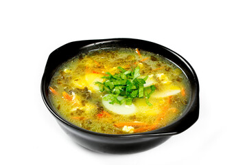 Traditional Asian Soup with Tofu and Vegetables in Black Bowl