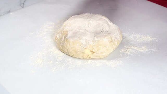 woman with roller pin working with dough