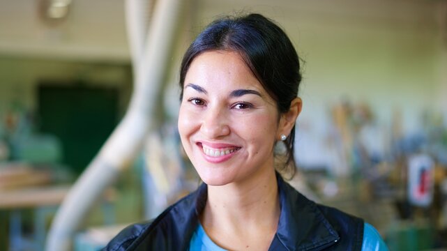 Woman creative artisan smiling in workshop portrait - Powered by Adobe