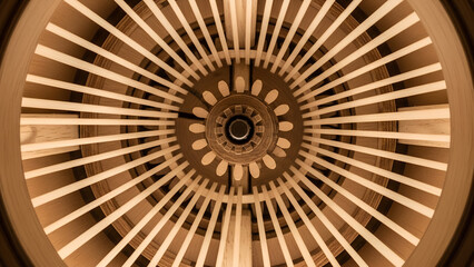 Circular ceiling design with radial beams and central focus  