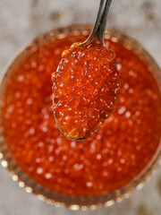 red caviar in the caviar bowl