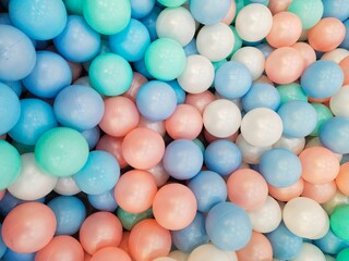 a pile of plastic balls in the ball pool at the Children's Playground	