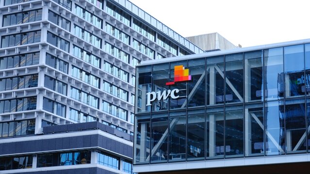 PWC PricewaterhouseCoopers logo sign on office buildings in capital city Wellington, New Zealand Aotearoa - taken on 6 Dec 2025