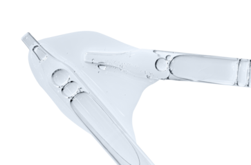 A sample of facial serum or gel or moisturizer with a pipette. Isolated on white