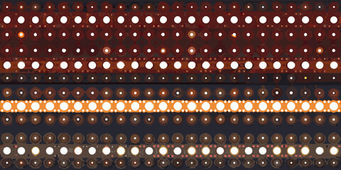 Abstract geometric pattern with rows of circles and glowing lights in warm earthy tones