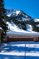 Ski and snowboard school in ski resort in winter