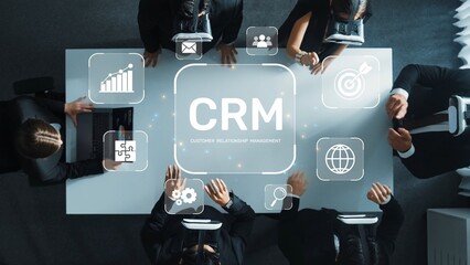 A business team collaborates on customer relationship management strategies using virtual reality...