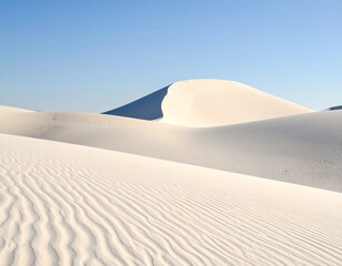 Sunny desert landscape showcasing white sand dunes and blue sky