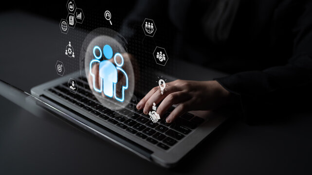 Glowing human figures surrounded by business icons representing HR data analysis, employee management, and recruitment analytics Parse - Powered by Adobe